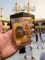 Gold crystal Tasbeeh counter photographed at the Kaaba