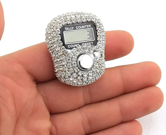 Silver rhinestone digital Tasbeeh counter shown in hand